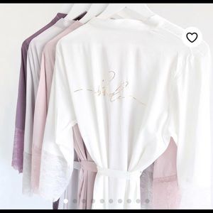 Bridal silk robe in white and gold lettering.